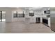 Bright kitchen features stainless steel appliances, white cabinets, and a bay window for natural light at 8546 Amber Oak Dr, Orlando, FL 32817