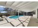 Inviting outdoor pool area with covered patio and ample seating space at 8546 Amber Oak Dr, Orlando, FL 32817