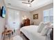 Bright bedroom with a comfortable bed, classic decor, and a peaceful ambiance at 8585 Cypress Ridge Ct, Sanford, FL 32771