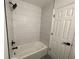 Bathroom with a newly tiled shower-bath at 948 Bird Bay Ct # 206, Lake Mary, FL 32746