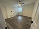 Cozy bedroom with hardwood floors, closet and a bright sunny window at 948 Bird Bay Ct # 206, Lake Mary, FL 32746