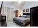 King-size bed in bright bedroom with private access at 970 E Michigan St # B, Orlando, FL 32806