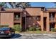 Two-story building, with multiple units and parking at 970 E Michigan St # B, Orlando, FL 32806