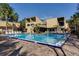 Community pool with plenty of lounge chairs at 970 E Michigan St # B, Orlando, FL 32806