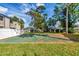 Community basketball court surrounded by well-maintained lawns and mature trees at 134 Springwood Cir # A, Longwood, FL 32750