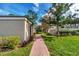 Exterior brick pathway leads between condo units at 134 Springwood Cir # A, Longwood, FL 32750