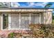 Exterior view with a door and white lattice wall at 134 Springwood Cir # A, Longwood, FL 32750