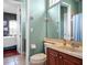 Bathroom featuring a large mirror, vanity and neutral color palette at 16315 Bristol Lake Cir, Orlando, FL 32828