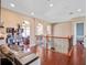 Loft featuring wood floors and decorative wrought iron at 16315 Bristol Lake Cir, Orlando, FL 32828