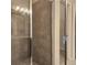 Tiled shower with glass enclosure at 1820 Shumard Ave, St Cloud, FL 34771