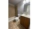 An inviting bathroom featuring a shower, toilet and vanity at 243 Scottsdale Sq # 243, Winter Park, FL 32792