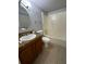 Bathroom with a white sink, toilet, and shower/tub combo at 243 Scottsdale Sq # 243, Winter Park, FL 32792