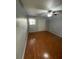 Bedroom featuring hard wood floors, natural light and a closet for storage at 243 Scottsdale Sq # 243, Winter Park, FL 32792