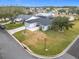 Beautiful aerial shot of the home and property in a mature residential neighborhood at 2488 Cherokee Ct, The Villages, FL 32162