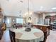 View of the dining room, kitchen, and living room area of the home at 2488 Cherokee Ct, The Villages, FL 32162