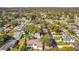 The aerial view shows the neighborhood and the proximity to the water and the home's private pool at 2520 Chanute Trl, Maitland, FL 32751