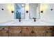 Bright bathroom featuring a double sink vanity with modern faucets and finishes at 2520 Chanute Trl, Maitland, FL 32751