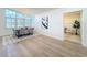 Dining room featuring large shuttered windows and a modern chandelier at 2520 Chanute Trl, Maitland, FL 32751