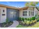 Charming entryway with stone pathway, dark wood door, and updated landscaping at 2520 Chanute Trl, Maitland, FL 32751