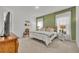 Well-lit bedroom featuring carpet, lots of natural light and simple elegant design at 3563 Fernanda Dr, Deltona, FL 32738