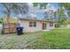 This home has a fenced backyard and a sliding glass door to the interior at 4108 Westgate Rd, Orlando, FL 32808