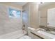 Bathroom with tiled shower, granite countertop and under-sink storage at 4108 Westgate Rd, Orlando, FL 32808