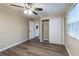 Bedroom with a window, closet and updated ceiling fan at 4108 Westgate Rd, Orlando, FL 32808