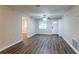 Bright living room with modern flooring, ceiling fan and neutral paint at 4108 Westgate Rd, Orlando, FL 32808