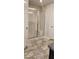 Large walk-in shower with glass enclosure and tiled walls at 411 Caribbean Ct, Kissimmee, FL 34759