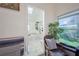 Bathroom showcasing a soaking tub and black accents at 441 Spoonbill Ct, Kenansville, FL 34739