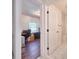 The ensuite bathroom showcases its marble floors and a view from the hall of the office space at 441 Spoonbill Ct, Kenansville, FL 34739