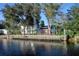 Waterfront view of the property from the canal at 441 Spoonbill Ct, Kenansville, FL 34739