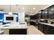 Modern kitchen with granite countertops and stainless steel appliances at 4651 Terrasonesta Dr, Davenport, FL 33837