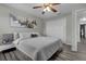 Serene bedroom boasts a comfortable bed, hardwood floors, and a spacious closet at 4941 Casa Vista Dr, Orlando, FL 32837