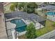 Aerial view of the screened pool, patio and backyard at 4941 Casa Vista Dr, Orlando, FL 32837