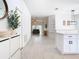 Inviting entryway featuring light wood floors and an open floorplan that flows into the living spaces at 4981 Waterside Pointe Cir, Orlando, FL 32829