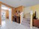 Inviting foyer featuring tile flooring, staircase and access to the main living areas at 5409 Caramella Dr, Orlando, FL 32829