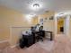 Upstairs office with carpet, neutral walls and built-in desk at 5409 Caramella Dr, Orlando, FL 32829