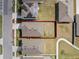 Aerial view of the property showcasing the roof and outlining the lot with red at 5654 Winona Dr, St Cloud, FL 34771