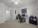 Bedroom with carpeted floors, light colored walls, and white doors at 5654 Winona Dr, St Cloud, FL 34771