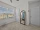 Neutral bedroom with a ceiling fan, and a large window with natural light at 5654 Winona Dr, St Cloud, FL 34771