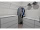 Walk-in closet with wire shelving and dresser storage at 5654 Winona Dr, St Cloud, FL 34771