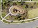 Aerial view of a community playground featuring modern play equipment and landscaping at 5654 Winona Dr, St Cloud, FL 34771