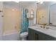 Bathroom with a tub and shower combination and modern vanity at 6443 Axeitos Ter # 105, Orlando, FL 32835