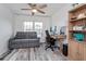 Office space with a desk, chair, and daybed at 6443 Axeitos Ter # 105, Orlando, FL 32835