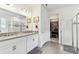 Double vanity bathroom with granite countertop at 739 Annabell Ridge Rd, Minneola, FL 34715