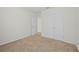 Well-lit bedroom featuring a closet and neutral paint tones creating a calming space at 817 Sheen Cir, Haines City, FL 33844