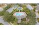 Aerial view showcasing the community pool, playground, basketball court, and parking at 10068 Chardonnay Dr, Orlando, FL 32832
