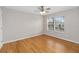Comfortable bedroom with hardwood floors and a ceiling fan to keep you cool at 10068 Chardonnay Dr, Orlando, FL 32832