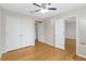Spacious bedroom features hardwood floors and ample closet space for storage at 10068 Chardonnay Dr, Orlando, FL 32832